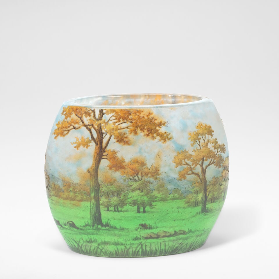 DAUM Nancy 'Paysage', vase, circa 1904: DAUM Nancy 'Paysage', vase, circa 1904 Enamel overlaid and cut glass, decorated with a landscape scene. 8 cm high, 10.5 cm wide, 5 cm deep Signed to the base DAUM NANCY and marked with the Cross of