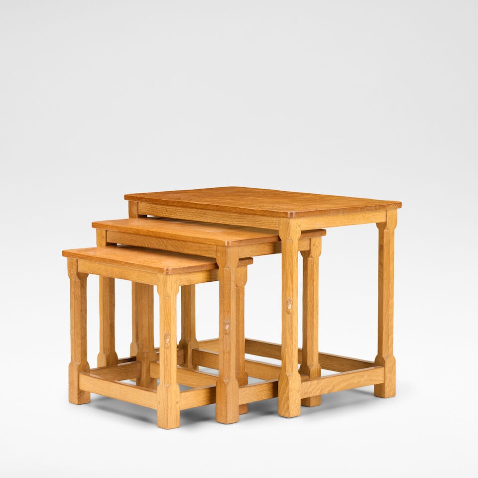 Robert 'Mouseman' Thompson Nest of tables, circa 1950: Robert 'Mouseman' Thompson Nest of tables, circa 1950 Oak, three tables, each raised on octagonal chamfered supports. Largest: 47 cm high, 61 cm wide, 37 cm deep Each with carved mouse to leg. This