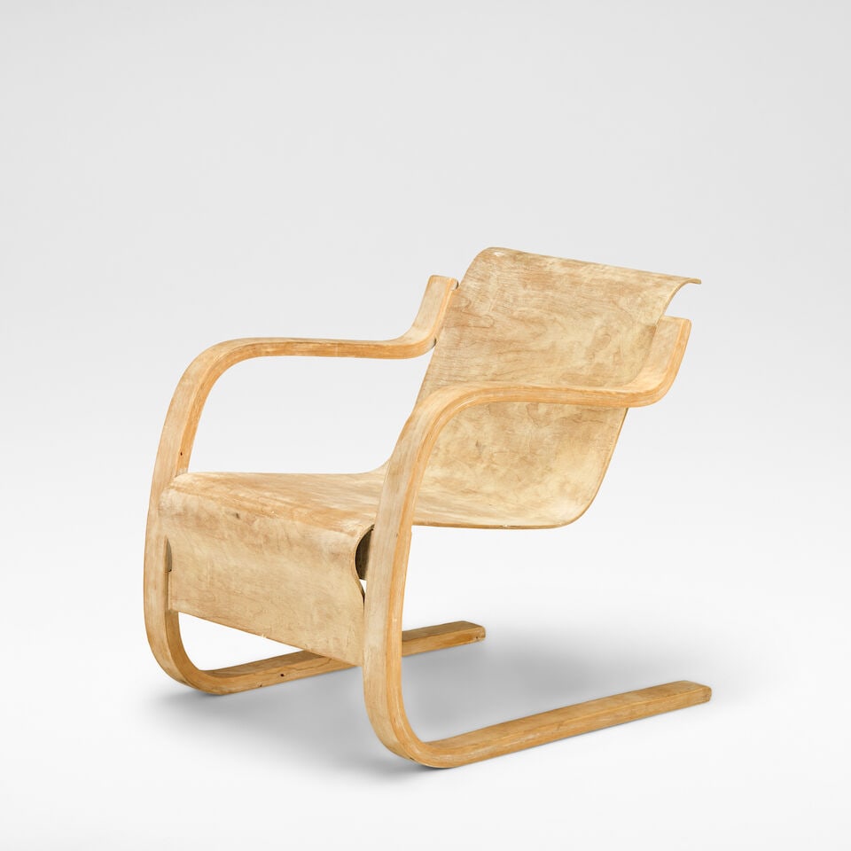 Alvar Aalto Cantilevered armchair, model no. 42, designed 1932: Alvar Aalto Cantilevered armchair, model no. 42, designed 1932 Sanded and limed birch-veneered bent plywood, bent limed birch. 69 cm high, 61 cm wide, 69 cm deep This lot is subject to the following