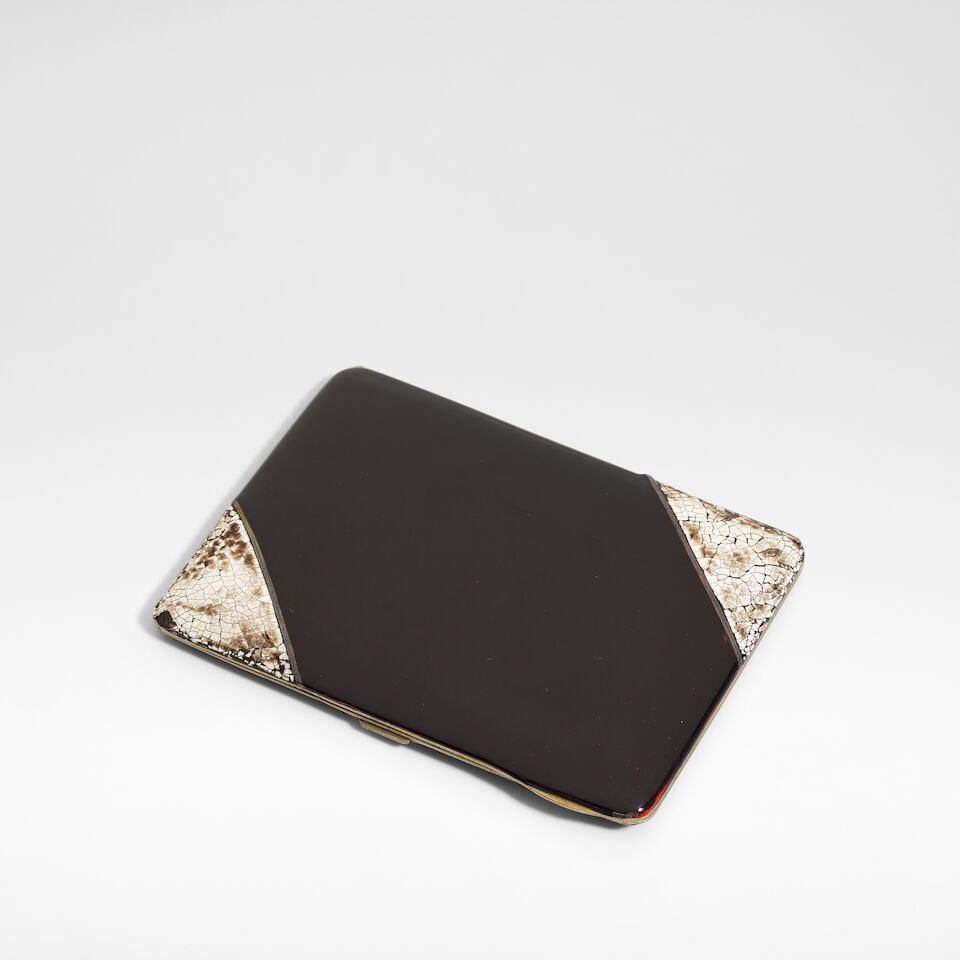 In the manner of Jean Dunand Art Deco cigarette casem circa 1930,: In the manner of Jean Dunand Art Deco cigarette casem circa 1930, Coquille d'œuf lacquer on white metal, internally gilt. 11.5 cm high, 8 cm wide, 1 cm deep Footnotes: Provenance The Collection