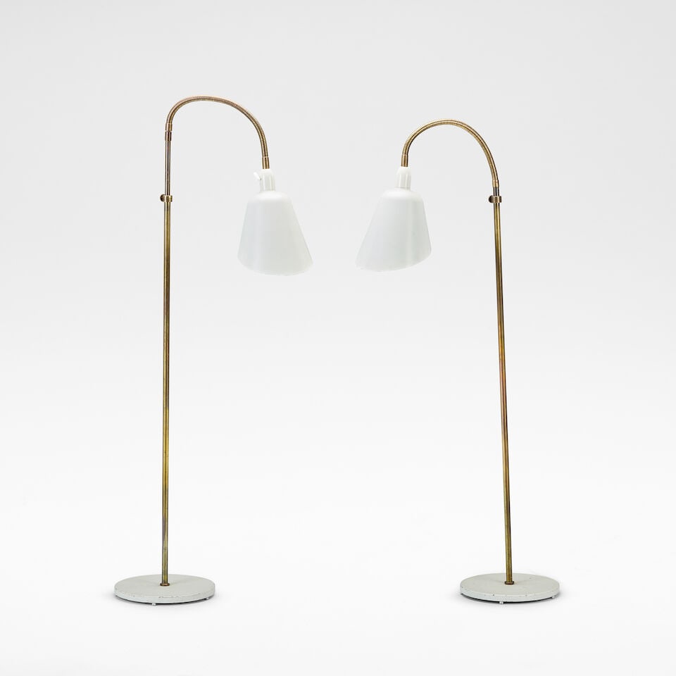 Arne Jacobsen Two 'Bellevue' standing lamps, model no. AJ7, designed 1929: Arne Jacobsen Two 'Bellevue' standing lamps, model no. AJ7, designed 1929 White lacquered metal, cast iron bases and brass stems. Tallest: 146 cm high, 26 cm diameter, 198 cm fully extended Each