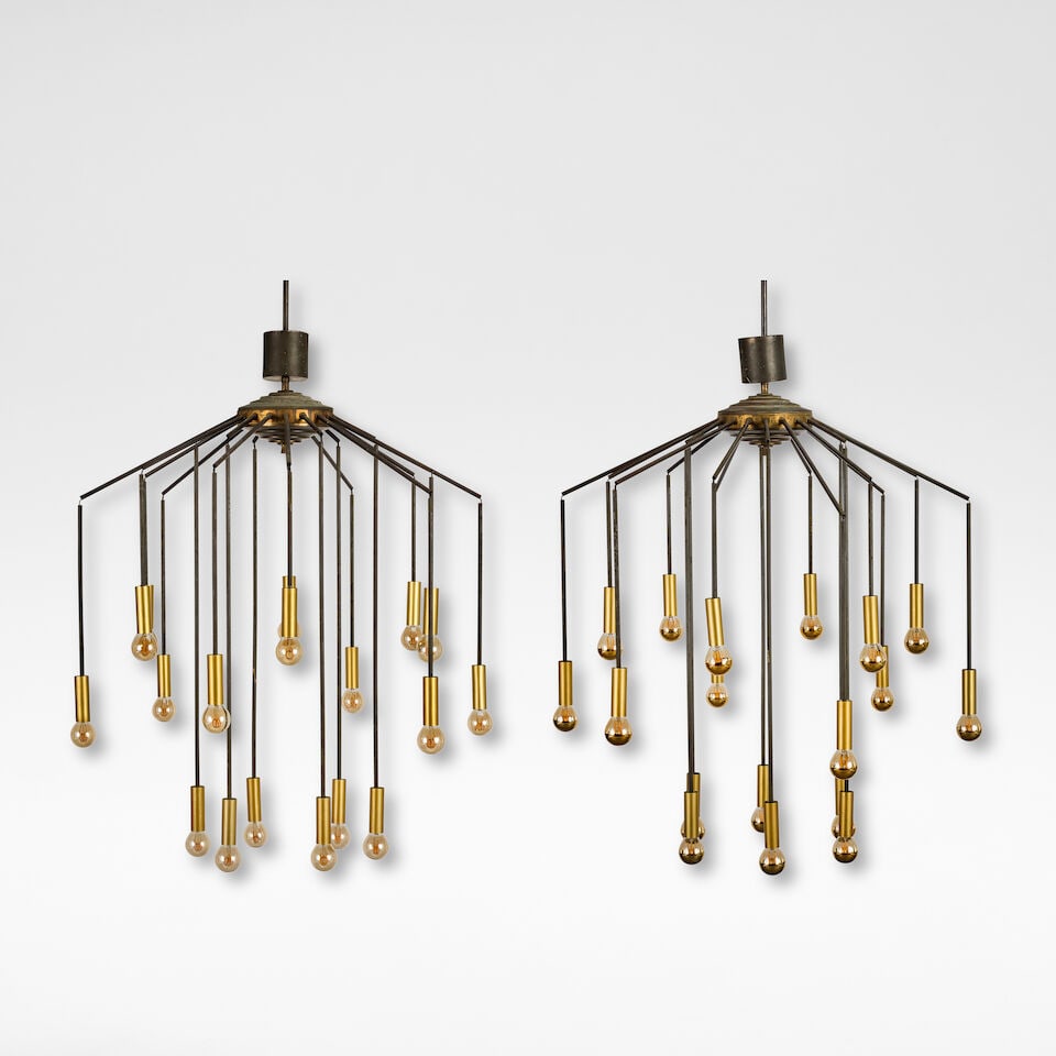 Attributed to Stilnovo Pair of chandeliers, circa 1950: Attributed to Stilnovo Pair of chandeliers, circa 1950 Gilt and patinated copper, each with eighteen arms of varying length emanating from the stepped circular centre, each terminating to a gilt