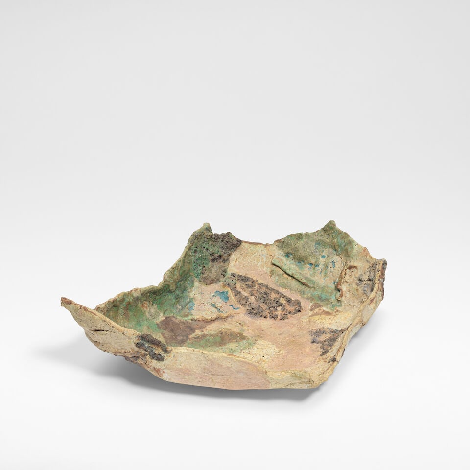 Ewen Henderson Large dish, circa 1985: Ewen Henderson Large dish, circa 1985 Mixed laminated clays, dry, crawling and volcanic glazes in green, cream, pink, black and blue colours, over a heavily textured surface. 14 cm high, 40.5 cm