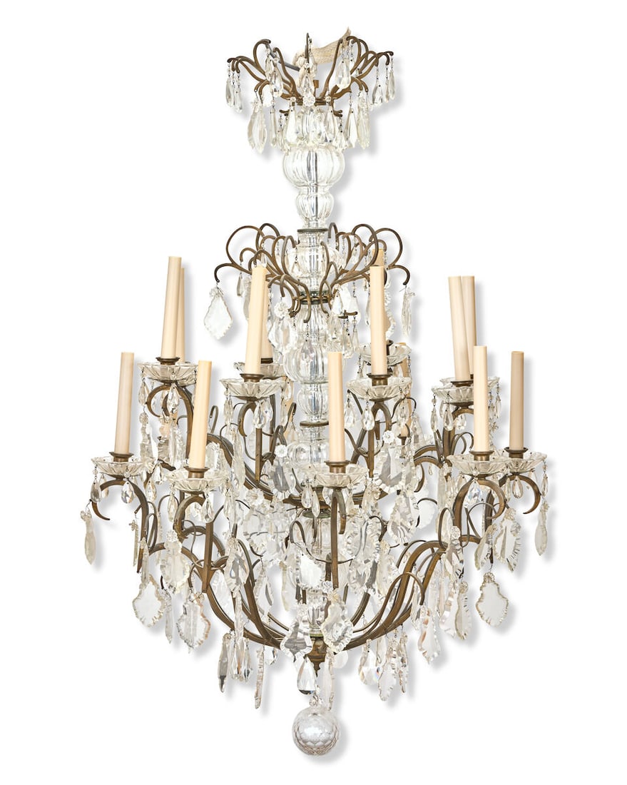 A late 19th/early 20th century patinated brass moulded and cut sixteen-light chandelier Supplied... (1 of 4)