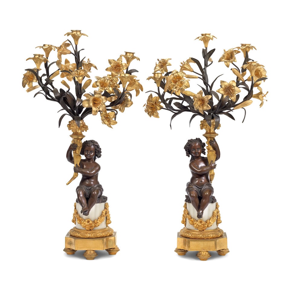 A pair of late 19th century French gilt and patinated bronze five-light figural garniture candel... - 2
