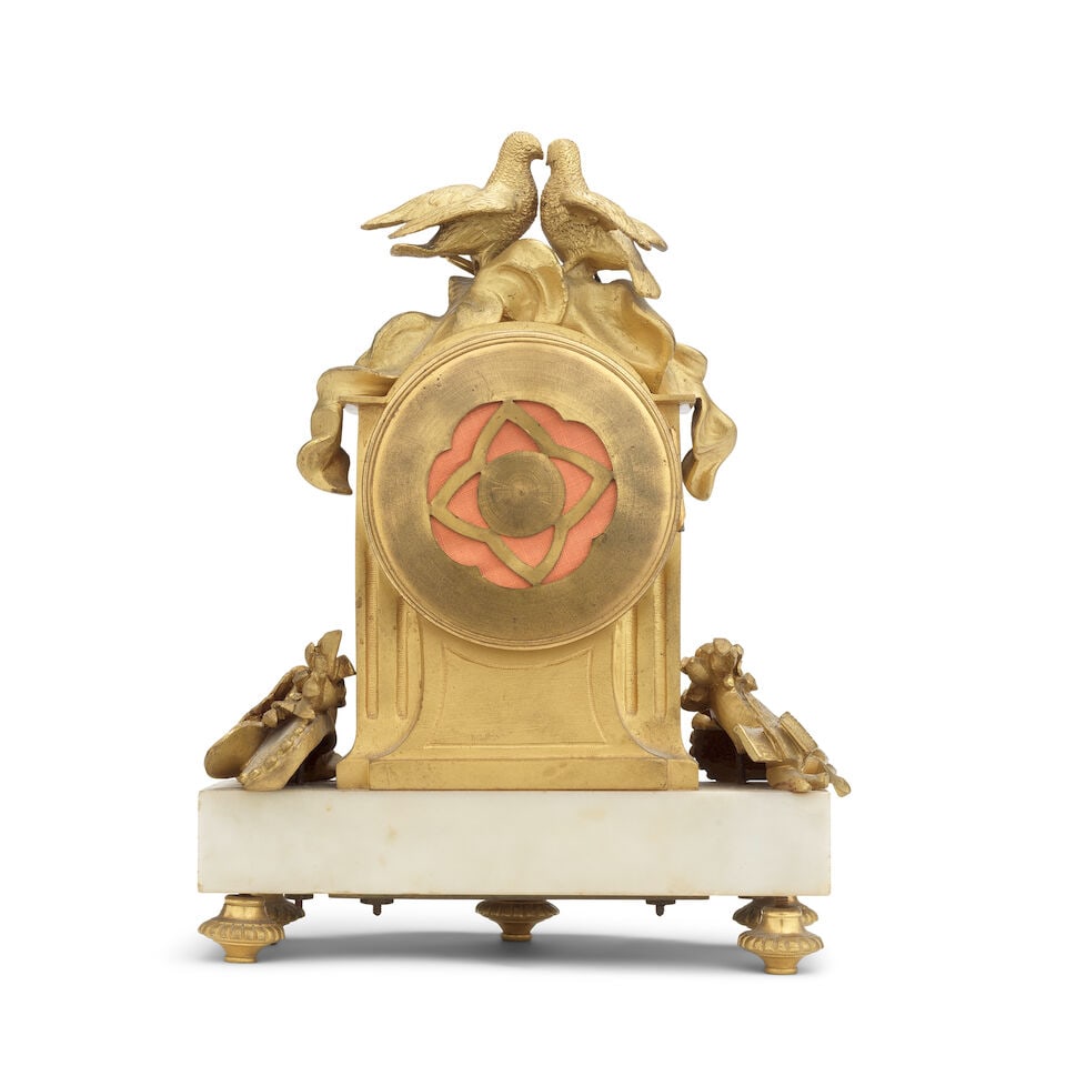 An early 20th century gilt bronze mounted white marble mantel clock In the Louis XIV style, t... - 2