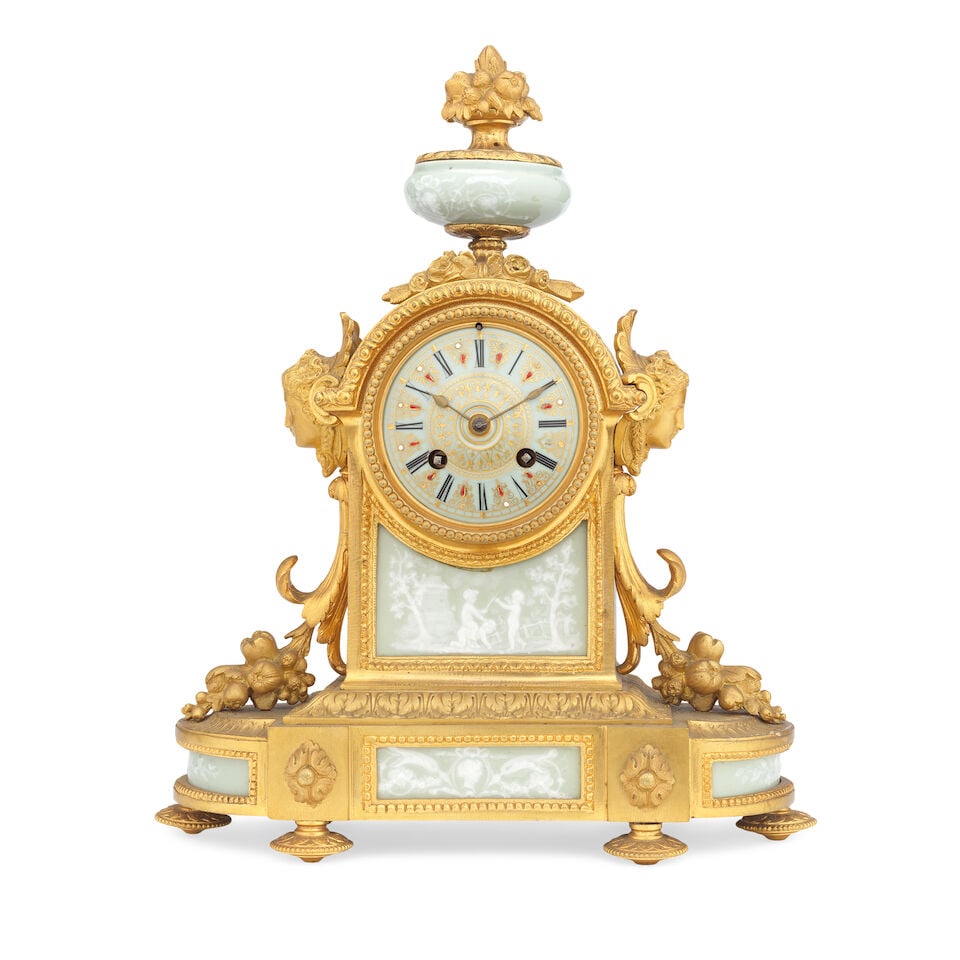 A late 19th century French gilt bronze mounted and pâte-sur-pâte style celadon glazed ...: A late 19th century French gilt bronze mounted and pâte-sur-pâte style celadon glazed porcelain inset mantle clock The movement with Japy Freres pastille, and additionally stamped Vaillant?