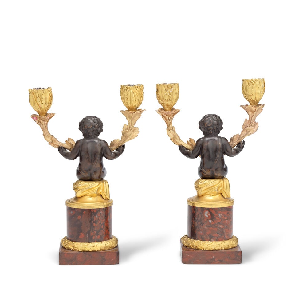 A pair of late 19th century French patinated and gilt bronze figural twin-light candelabra The f... - 2