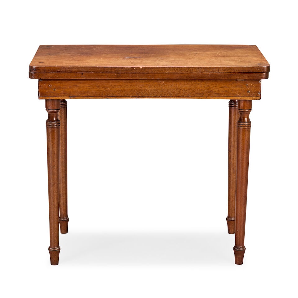 A small late Victorian mahogany campaign tea table with detachable legs 1880-1900: A small late Victorian mahogany campaign tea table with detachable legs 1880-1900 With a lockable swivel hinged top, on four detachable screw-in turned and tapering legs, 73.5cm wide x 46cm deep x 65.