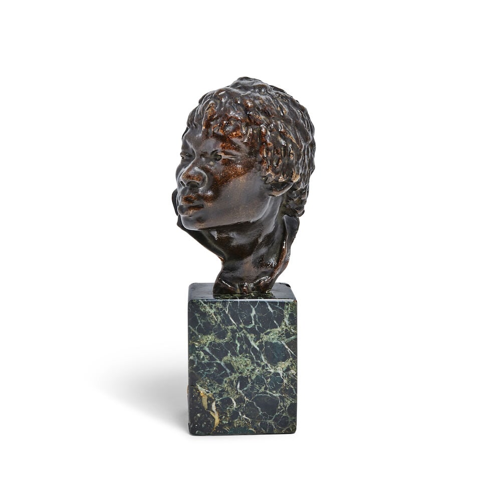 Herbert Ward (British, 1863-1919): A patinated bronze bust of the head of an African tribesman: Herbert Ward (British, 1863-1919): A patinated bronze bust of the head of an African tribesman The sitter looking to dexter, signed within the cast to the rear left edge Herbert Ward, mounted on a vei