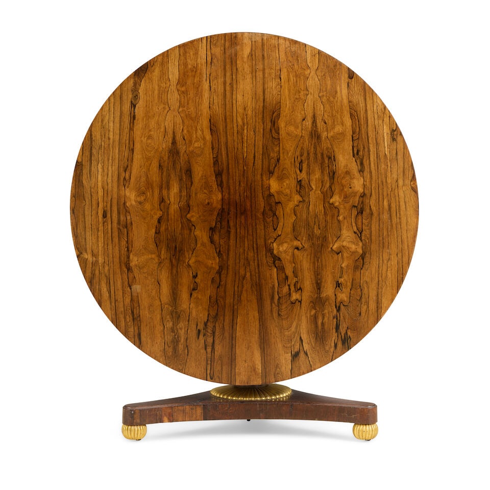 A Regency rosewood and parcel gilt breakfast table Circa 1815 - 2