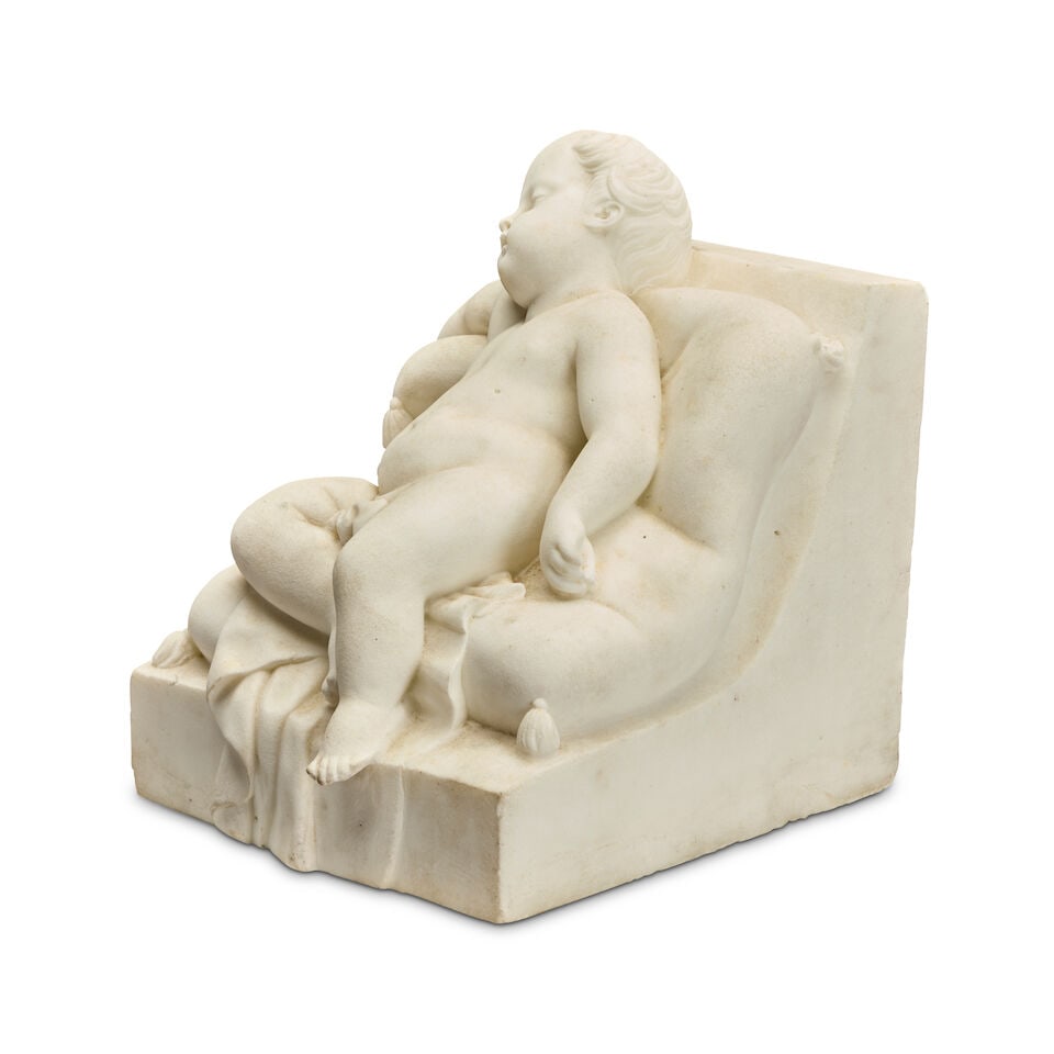 A 19th century carved white marble figure of a reclining putto Probably Italian - 2