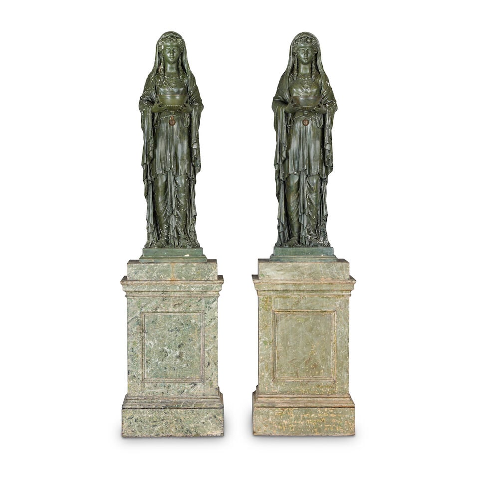 A pair of Regency bronzed plaster figural torcheres formed as Vestal Virgins, mounted on faux ma...: A pair of Regency bronzed plaster figural torcheres formed as Vestal Virgins, mounted on faux marble painted wood pedestals Circa 1810, the figures in the manner of Francis Hardenberg (Anglo-German, f