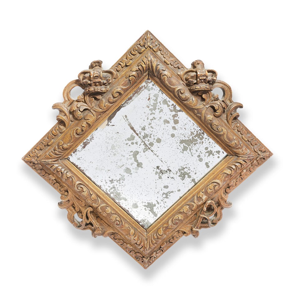 OF ROYAL/HISTORICAL INTEREST - A small and rare Queen Anne hatchment frame Circa 1710, later ada...: OF ROYAL/HISTORICAL INTEREST - A small and rare Queen Anne hatchment frame Circa 1710, later adapted for use as a mirror The later plate within a frame of lozenge outline, encompassed by a scrolled st