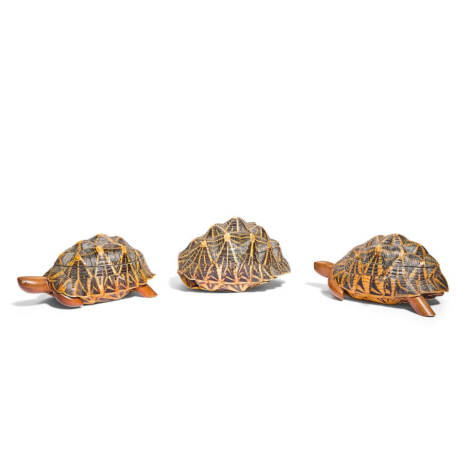 Three late 19th century Indian tortoiseshell and hardwood tea caddies (3): Three late 19th century Indian tortoiseshell and hardwood tea caddies Each in the form of a tortoise with polished natural shells, two fitted with wooden heads and legs, the hinged shells of each open