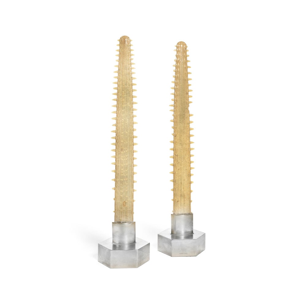A pair of Antony Redmile electroplated nickel mounted sawfish rostrums Circa 1970's: A pair of Antony Redmile electroplated nickel mounted sawfish rostrums Circa 1970's The hexagonal plinth bases marked Redmile London,, 65cm high Footnotes: Born in 1940, Anthony Redmile established hi