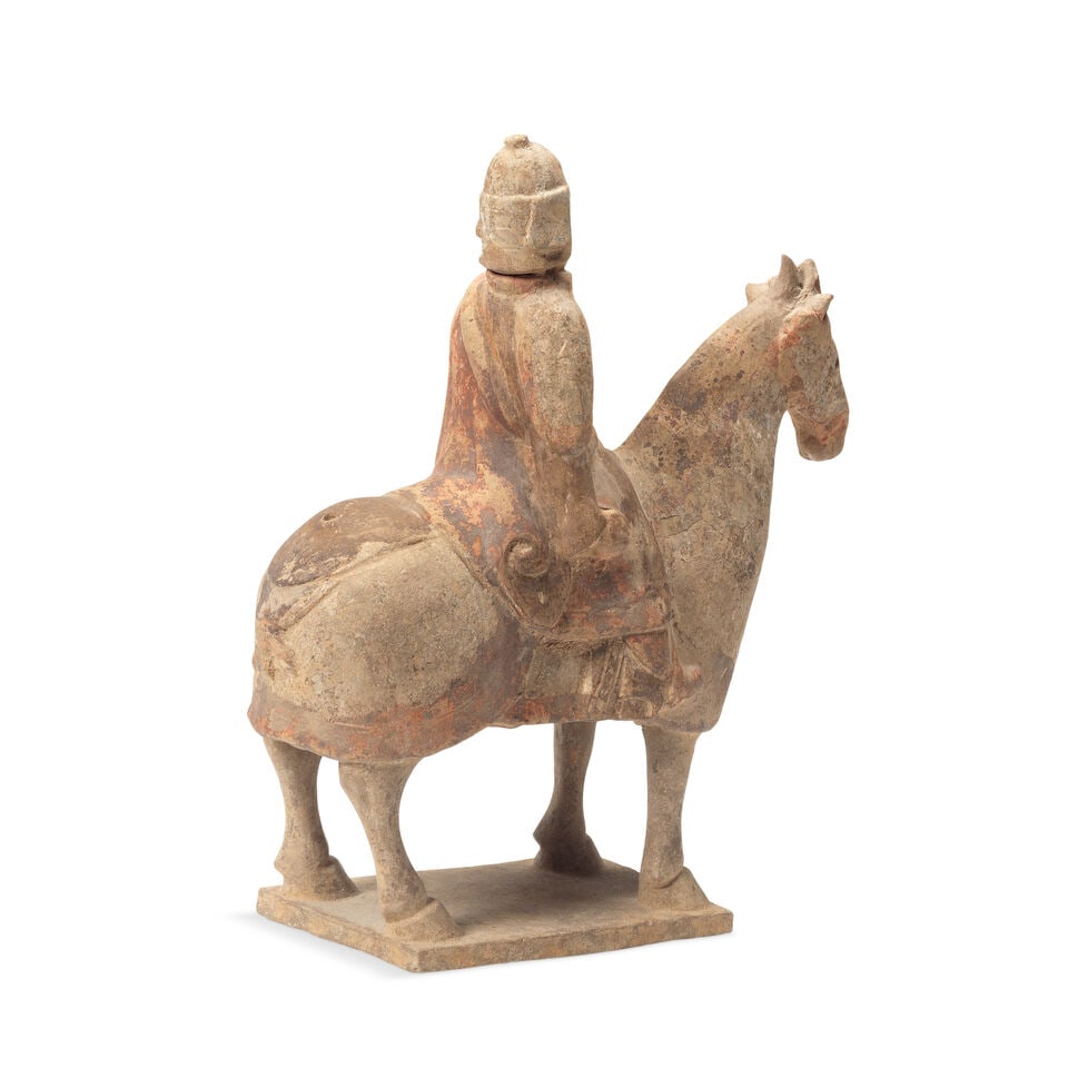 A Chinese terracotta equestrian group of a warrior on horseback Tang Dynasty (618-907) - 2