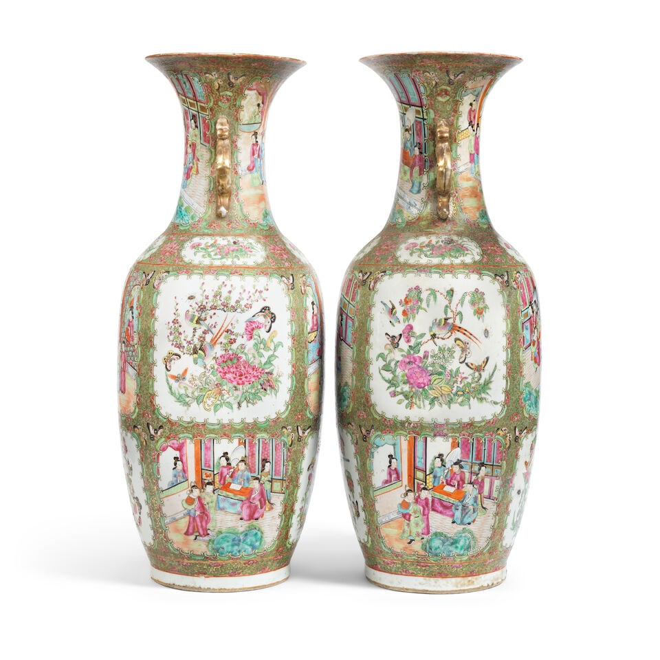 A pair of Chinese Famille Rose porcelain garniture vases Qing dynasty, probably late 19th centu...: A pair of Chinese Famille Rose porcelain garniture vases Qing dynasty, probably late 19th century Of typical baluster form with flared necks and applied gilt twin scrolling serpent handles, the bodies