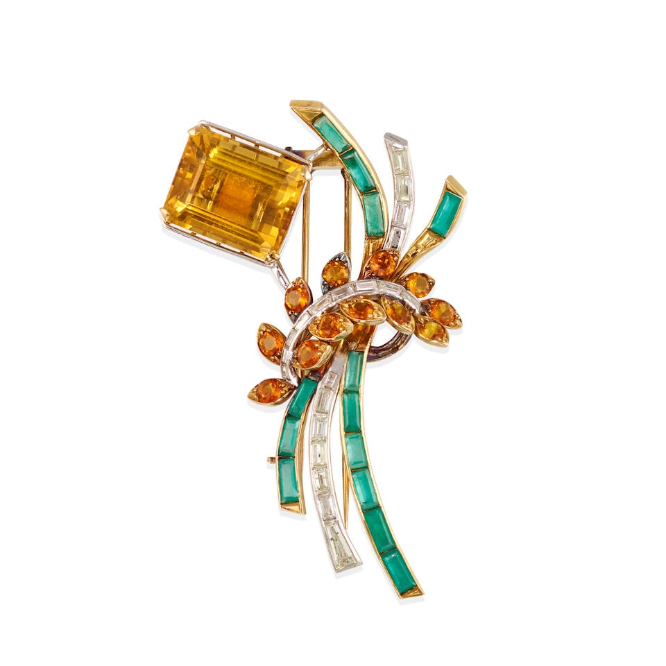 14K BICOLOR GOLD, DIAMOND, CITRINE AND EMERALD BROOCH: 14K BICOLOR GOLD, DIAMOND, CITRINE AND EMERALD BROOCH • 14k yellow and white gold • Numerous baguette diamonds weighing approximately 1.35 - 1.45 carat total • 12 round citrines