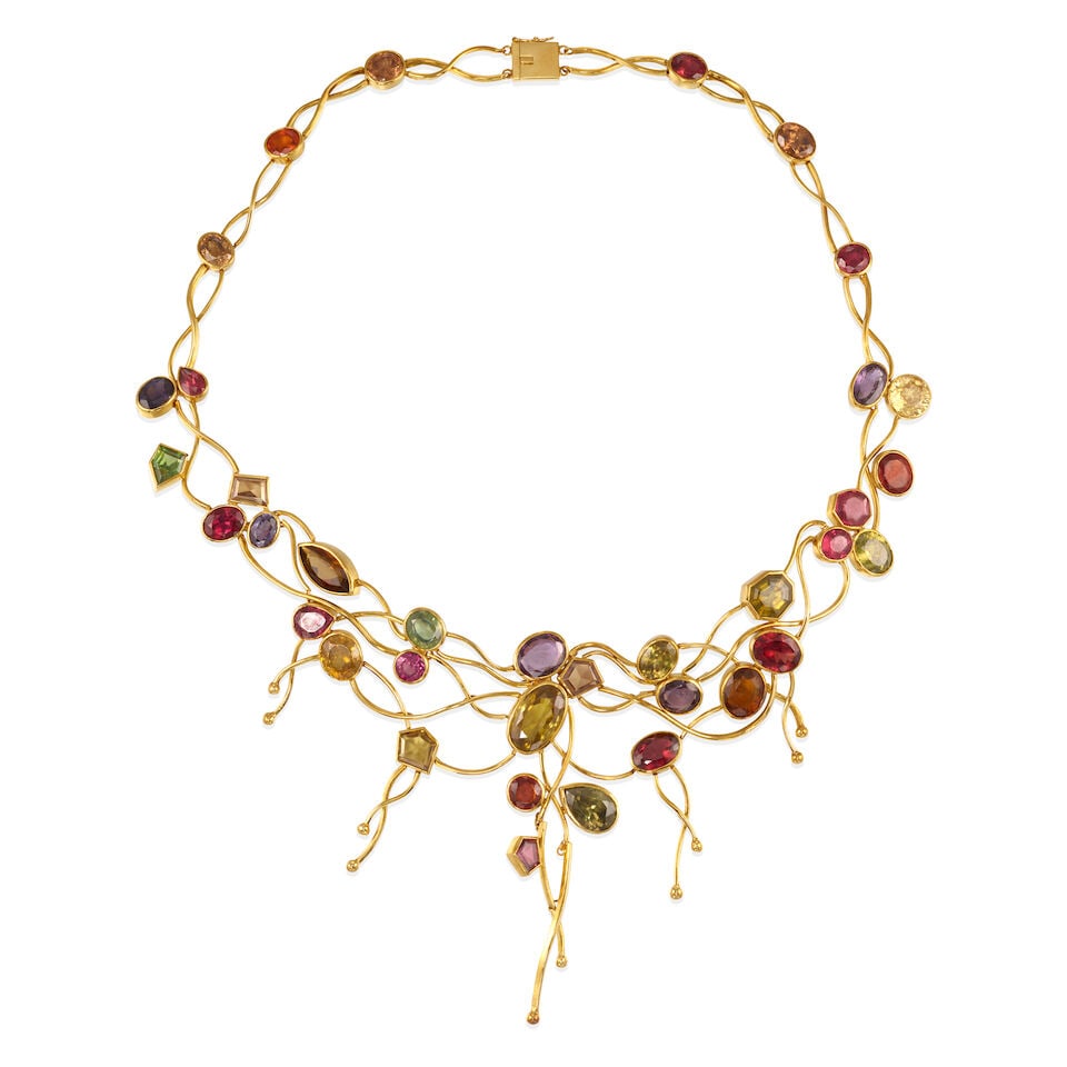 18K GOLD AND GEM-SET NECKLACE: 18K GOLD AND GEM-SET NECKLACE • 18k yellow gold • Numerous gemstones of varying shapes and sizes 6.36 - 13.96 mm • Length 16 1/2 in. • Estimated gross weight: 87.8