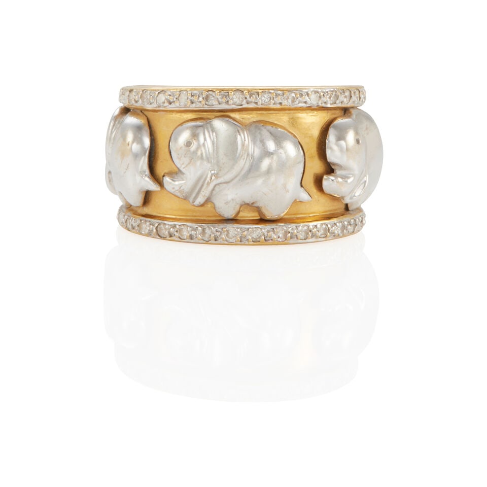 18K BICOLOR GOLD AND DIAMOND RING: 18K BICOLOR GOLD AND DIAMOND RING • 18k yellow and white gold • Numerous round diamonds weighing approximately 0.10 - 0.20 carat total • Italian registered trademark and maker's