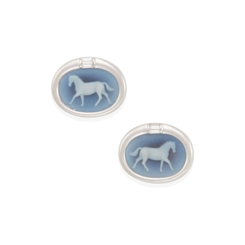 PLATINUM, ONYX CAMEO, AND DIAMOND CUFFLINKS: PLATINUM, ONYX CAMEO, AND DIAMOND CUFFLINKS • Platinum • 2 oval shape carved onyx horse cameos measuring 17.70 x 12.90 x 2.50 mm each • 4 baguette diamonds weighing approximately