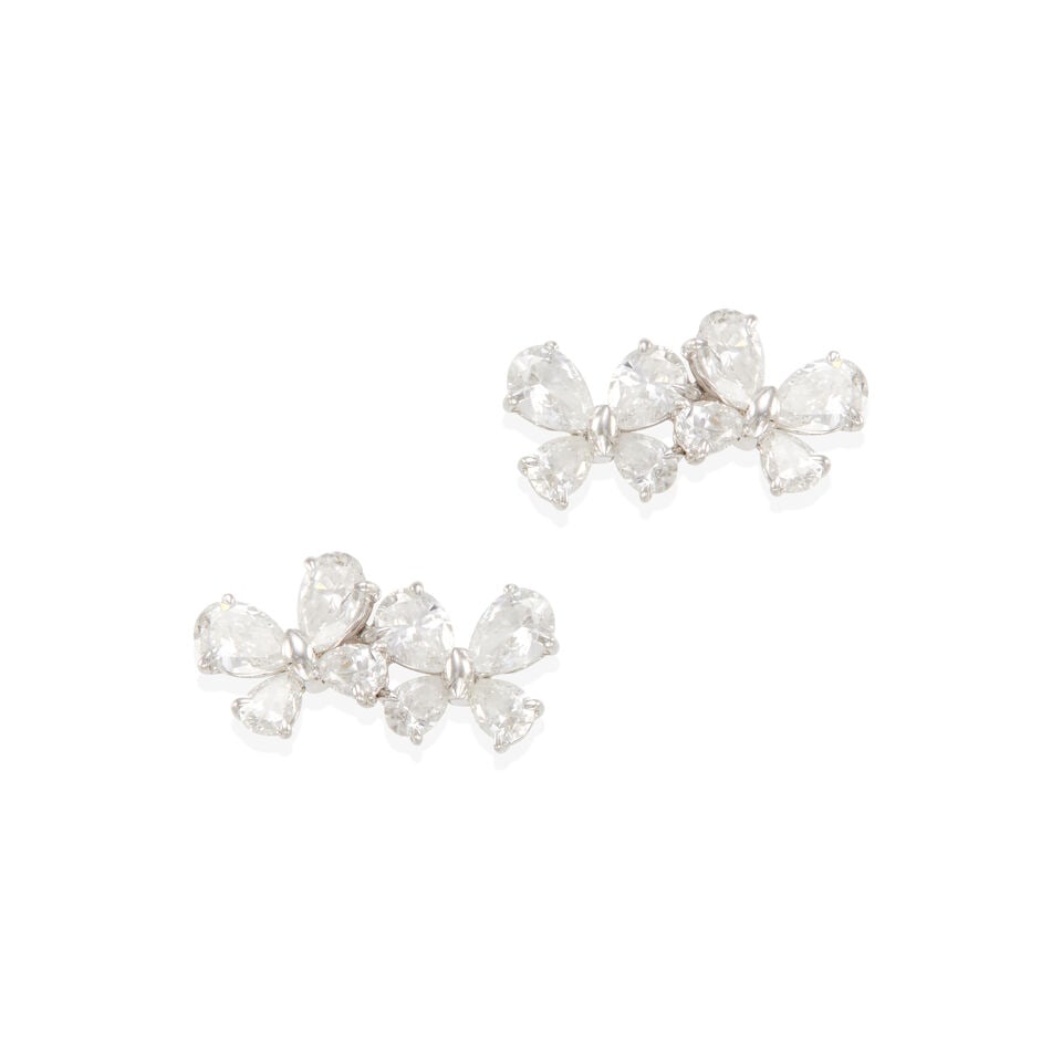 18K GOLD AND DIAMOND EARRINGS: 18K GOLD AND DIAMOND EARRINGS • 18k white gold • 12 pear-shaped diamonds weighing approximately 2.25 - 2.35 carats total • Measures 3/4 x 1/2 in. • Estimated gross weight: 5.0