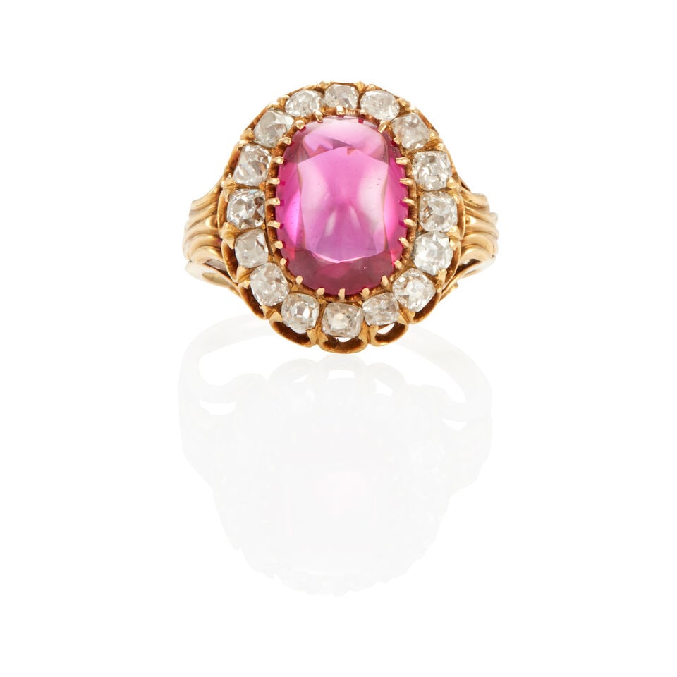 A 14K GOLD, SYNTHETIC RUBY AND DIAMOND RING (1 of 3)