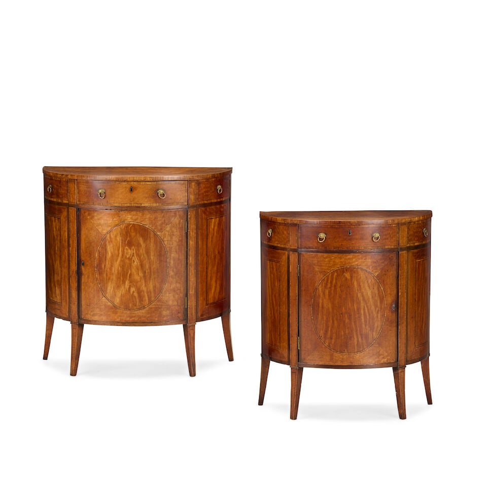 A pair of satinwood and rosewood demi-lune cabinetsLate 19th century, in the George III style (2) (1 of 2)