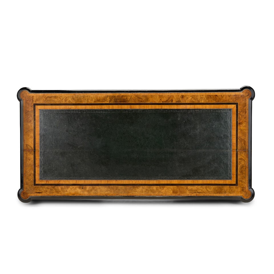 A Victorian walnut, tulipwood, ebonised and gilt metal mounted pedestal deskThird quarter 19th c... - 2