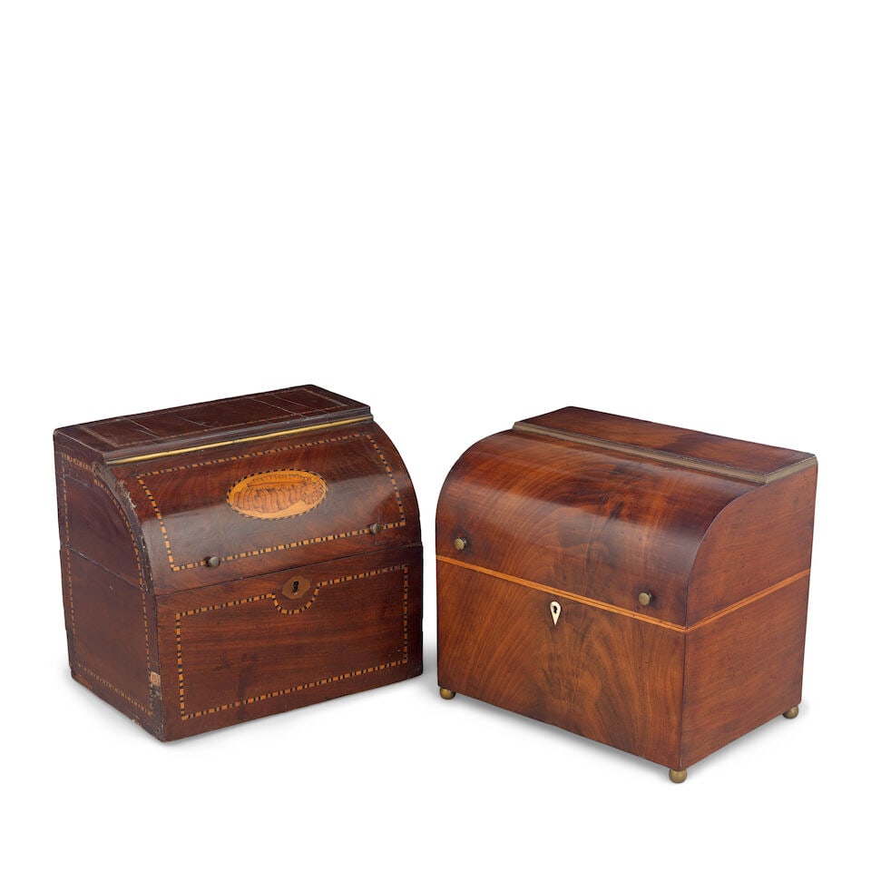 A George III mahogany domed top decanter box Early 19th century (2): A George III mahogany domed top decanter box Early 19th century The hinged top enclosing six glass and gilt decorated decanters, and a pair of liqueur glasses, with bone escutcheon, together with a si