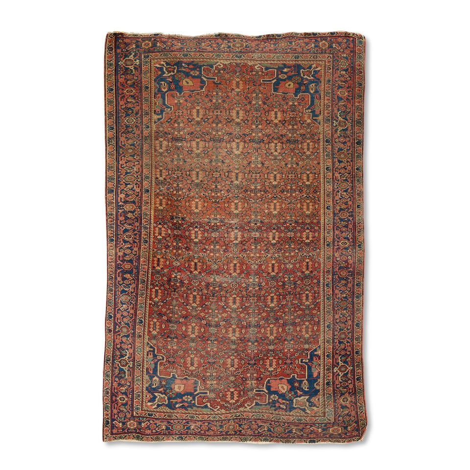 A Feraghan Mahal rug North West Persia 196.5cm x 128cm: A Feraghan Mahal rug North West Persia 196.5cm x 128cm This lot is subject to the following lot symbols: TP TP For auctions held in Scotland: Please refer to the catalogue and/or after-sale informatio