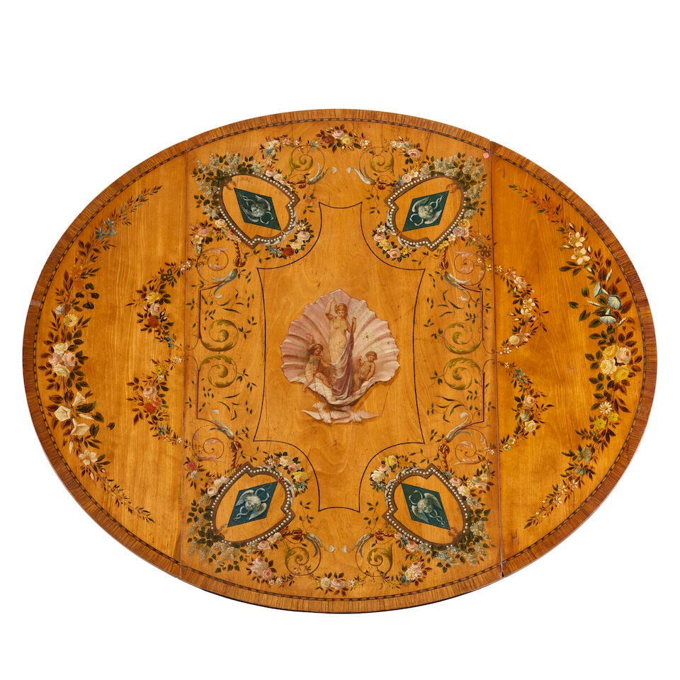 A George III satinwood, tulipwood crossbanded and later polychrome decorated Pembroke table Late...: A George III satinwood, tulipwood crossbanded and later polychrome decorated Pembroke table Late 18th century and later painted The oval top painted with floral sprays, Classical cartouches and a cent