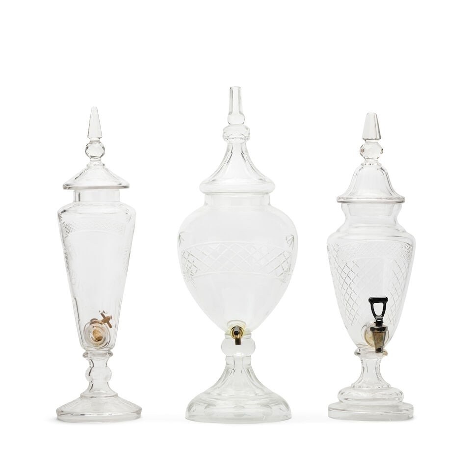 A Victorian glass spirit dispenser by L Lumley & Co Ltd London, together with two other dispense... (1 of 2)