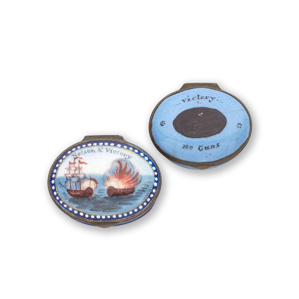 Two South Staffordshire enamel patch boxes, early 19th century: Two South Staffordshire enamel patch boxes, early 19th century One painted with 'Nelson & Victory', the British ship firing at the enemy vessel already ablaze, the border and base in deep blue, 4.4cm