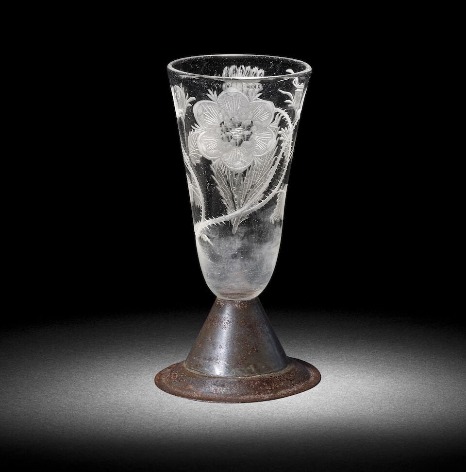 An interesting Jacobite engraved wine flute, circa 1750: An interesting Jacobite engraved wine flute, circa 1750 The tall round funnel bowl decorated with a six-petalled heraldic rose on a leafy stem with two buds, one closed and one open, the reverse with