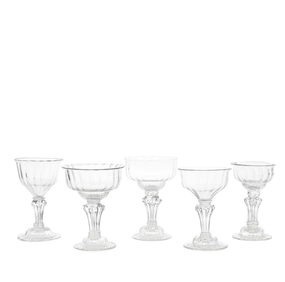 Five attractive moulded stem sweetmeat or champagne glasses, circa 1740-50: Five attractive moulded stem sweetmeat or champagne glasses, circa 1740-50 With rib-moulded bowls and feet, comprising three with eight-sided teared pedestal stems with diamonds on the shoulders, incl