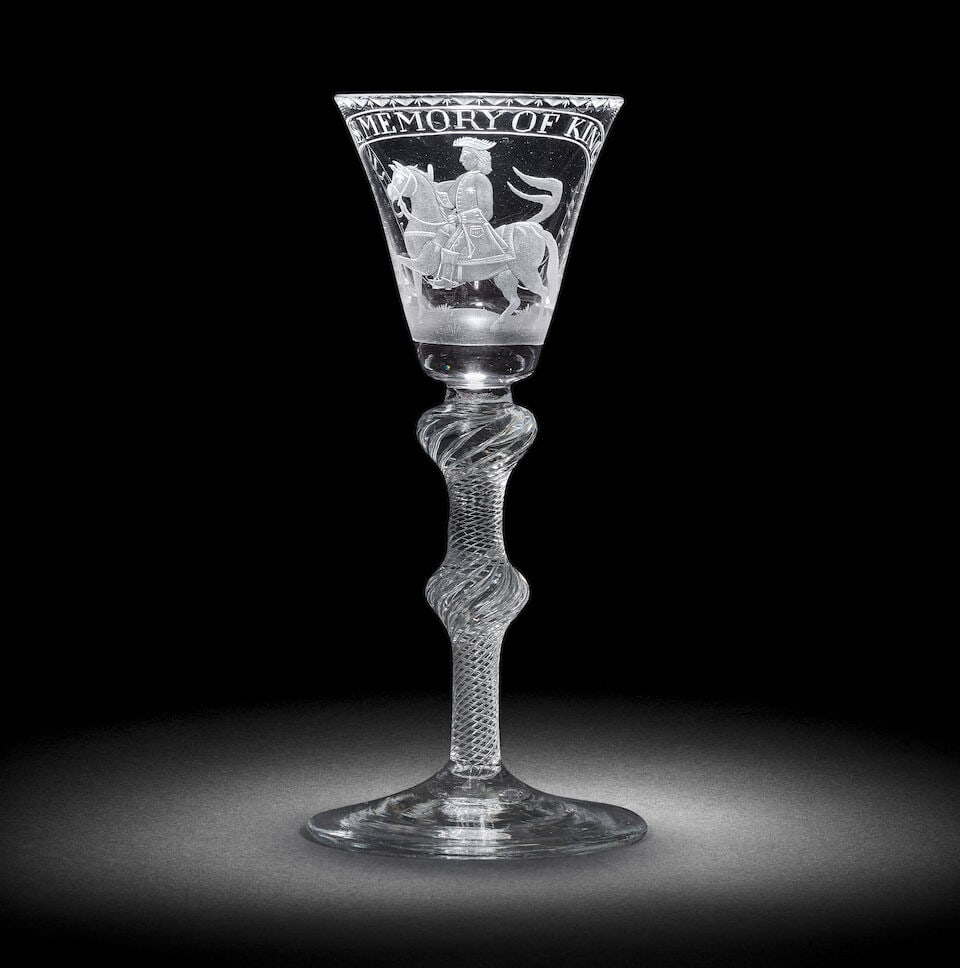 A Williamite engraved airtwist wine glass, the glass circa 1750: A Williamite engraved airtwist wine glass, the glass circa 1750 The engraving probably later and perhaps by Franz Tieze, one with a flared bucket bowl solid at the base, with the equestrian portrait o