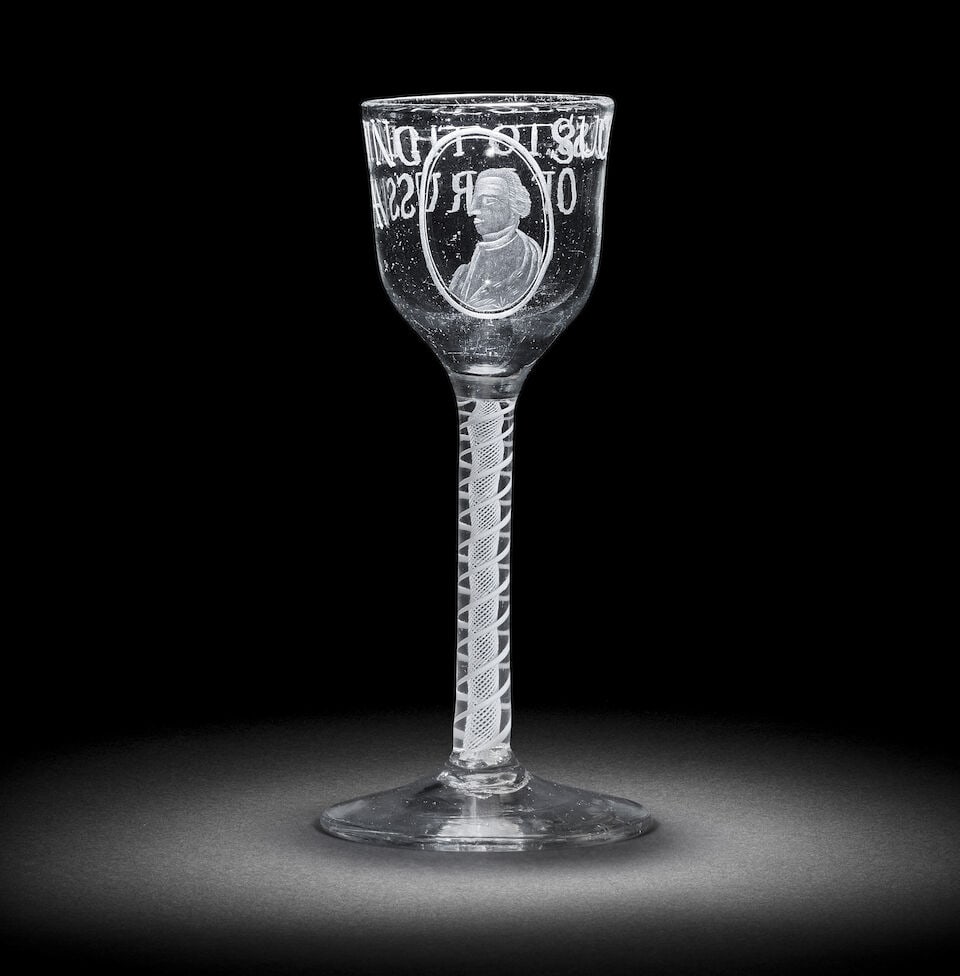 An engraved 'King of Prussia' opaque twist portrait wine glass, circa 1760: An engraved 'King of Prussia' opaque twist portrait wine glass, circa 1760 The ogee bowl with a half-length profile portrait bust of Frederick the Great within an oval frame, inscribed 'SUCCESS TO THE