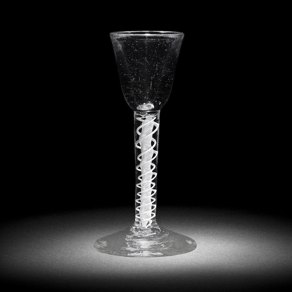 A fine deceptive opaque twist toastmaster's wine or cordial glass, circa 1765 (1 of 1)