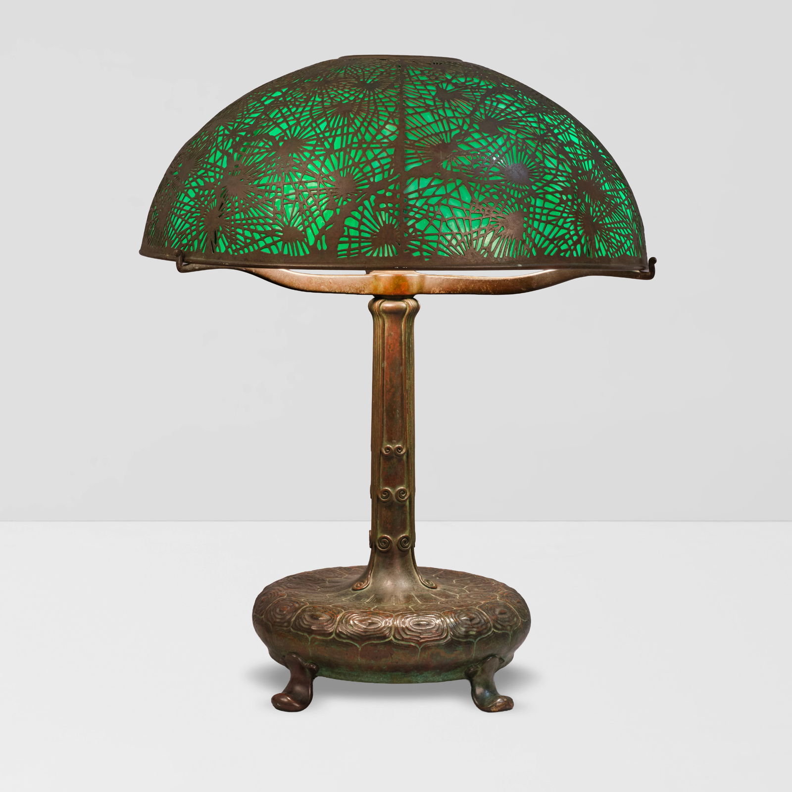 TIFFANY STUDIOS (1899-1930) Pine Needle Table Lampcirca 1900with Mud Turtle base, patinated bron...: TIFFANY STUDIOS (1899-1930) Pine Needle Table Lamp circa 1900 with Mud Turtle base, patinated bronze, leaded glass, base stamped 'TIFFANY STUDIOS NEW YORK 28618' on underside height 20 1/2in (52.1cm);