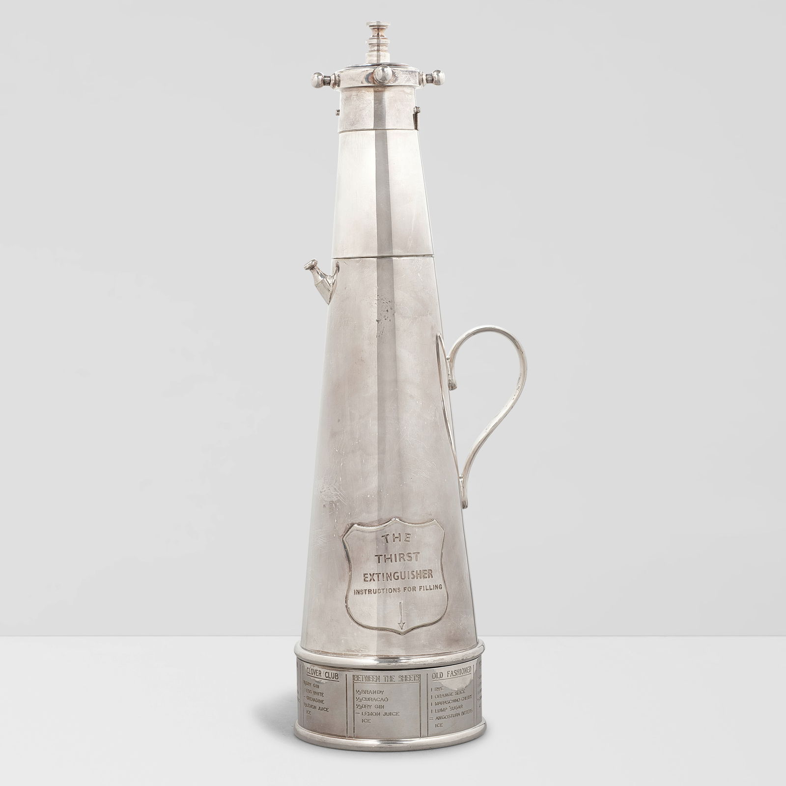 ASPREY & CO. (ESTABLISHED 1781) Thirst Extinguisher Cocktail Shakercirca 1932silverplate, marked...: ASPREY & CO. (ESTABLISHED 1781) Thirst Extinguisher Cocktail Shaker circa 1932 silverplate, marked 'A & Co. ASPREY LONDON 3212S MADE IN ENGLAND, REGD NO 833773' on underside height 14 3/4in (37.5cm);