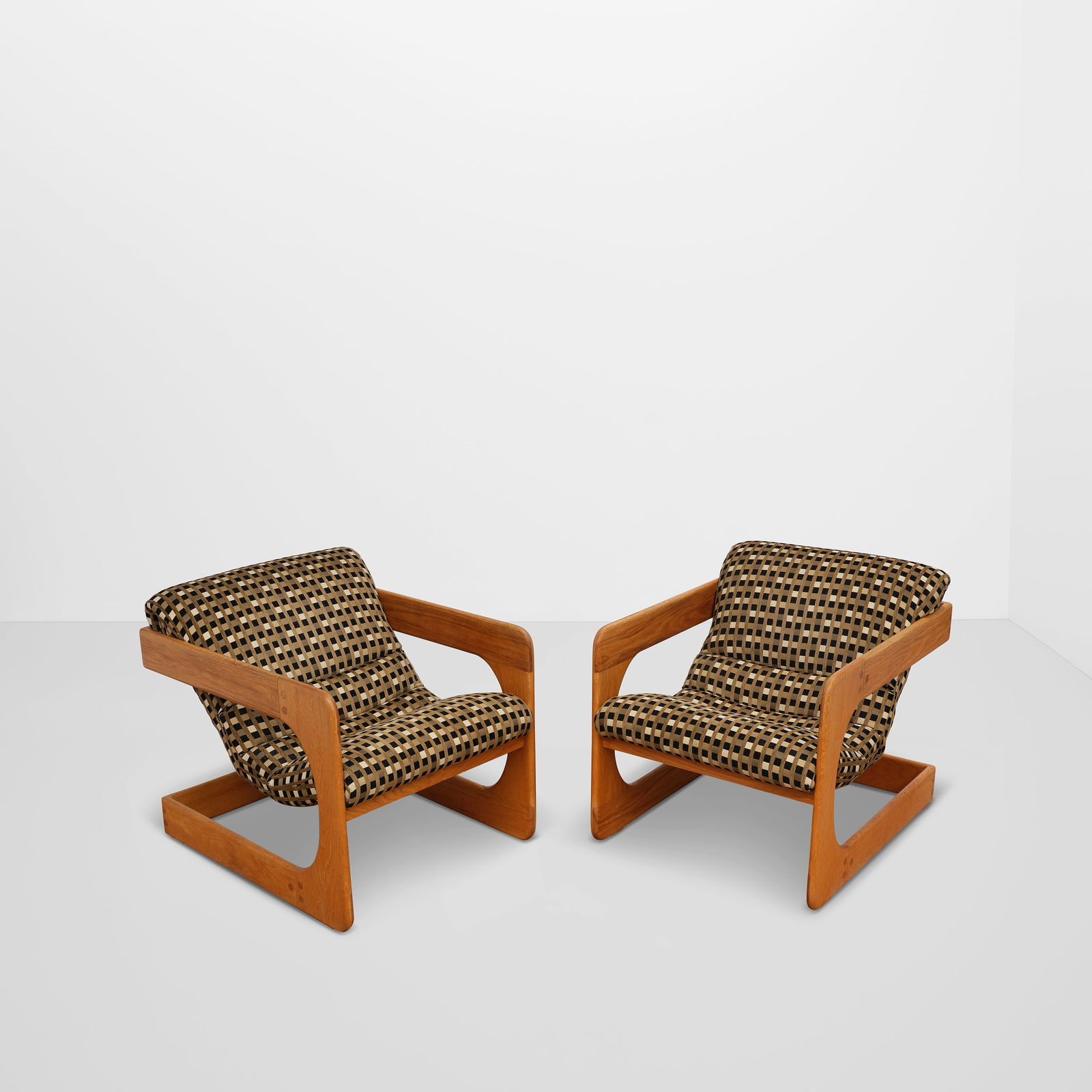 LOU HODGES (1937-2003) Pair of Armchairscirca 1975for California Design Group, oak, upholsteryh...: LOU HODGES (1937-2003) Pair of Armchairs circa 1975 for California Design Group, oak, upholstery height 28in (71.1cm); width 25 3/4in (65.4cm); depth 32in (81.3cm)