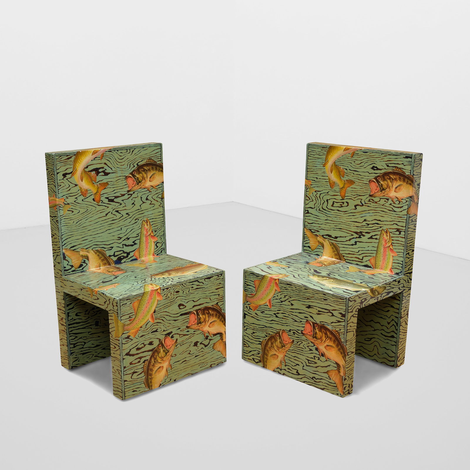 PERCY GIBBAR (ACTIVE 20TH CENTURY) Pair of Sportsman's Chairs1981painted wood, each signed 'Perc...: PERCY GIBBAR (ACTIVE 20TH CENTURY) Pair of Sportsman's Chairs 1981 painted wood, each signed 'Percy Gibbar' and dated on the underside height of each 37in (94cm), width 21 1/2in (54.6cm), depth 18 1/2