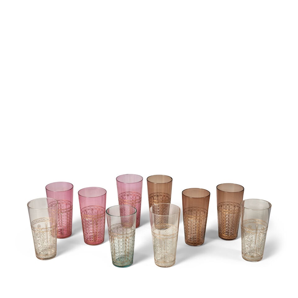 TEN J. & L. LOBMEYR BEAKERS Austria, circa 1900, engraved glass, silver and gold gilt decoration...: TEN J. & L. LOBMEYR BEAKERS Austria, circa 1900, engraved glass, silver and gold gilt decoration, all with gilded maker's mark, seven in colored and clear glass with stylized trellised decoration, thr