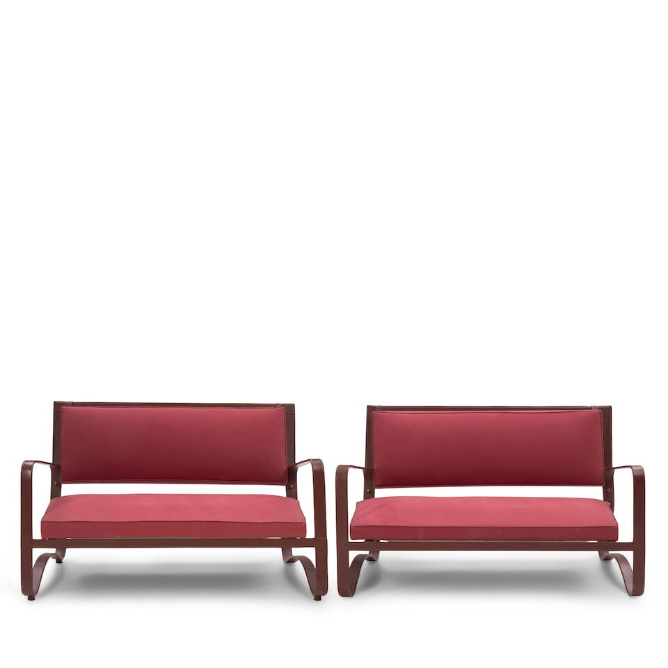 PAIR OF JACQUES ADNET (1900-1984) SETTEES France, circa 1950, leather over steel, upholstery, u... (1 of 3)