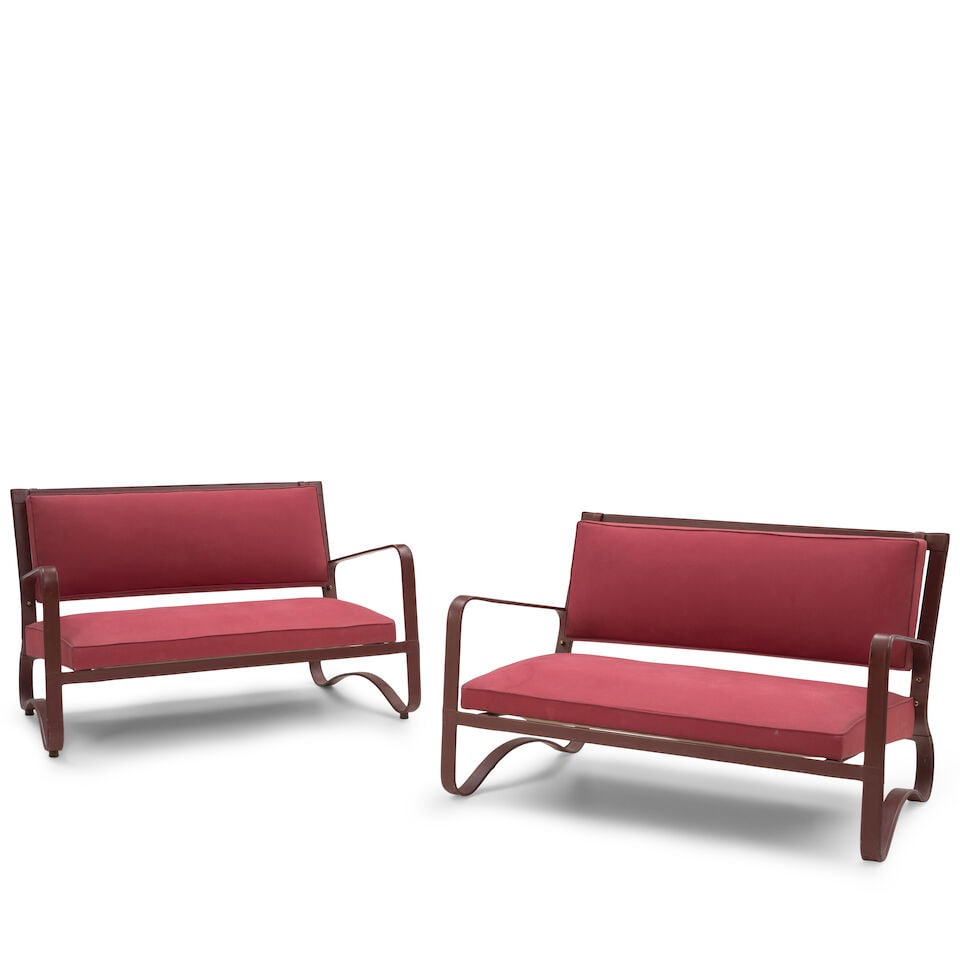 PAIR OF JACQUES ADNET (1900-1984) SETTEES France, circa 1950, leather over steel, upholstery, u... - 2