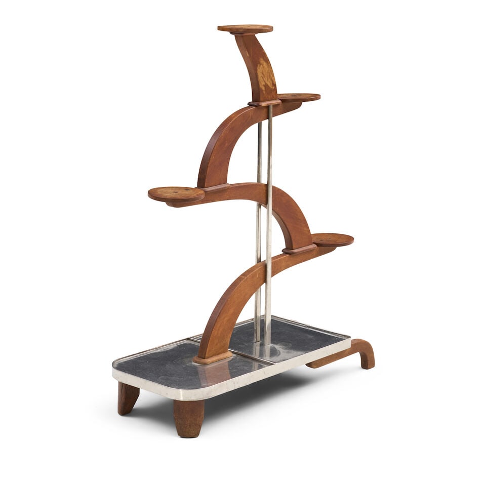 ART DECO PLANT STAND IN THE MANNER OF ANDRE GROULT probably France, circa 1935, mahogany, stainl... - 2