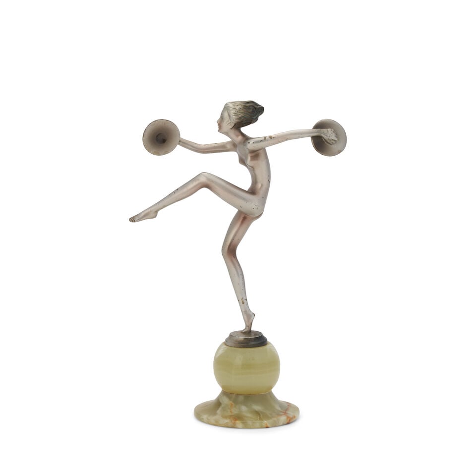 JOSEF LORENZL (1892-1950) NUDE DANCER WITH CYMBALS Vienna, Austria, circa 1930, nickel-plated br...: JOSEF LORENZL (1892-1950) NUDE DANCER WITH CYMBALS Vienna, Austria, circa 1930, nickel-plated bronze, onyx, molded signature 'Lorenzl,' ht. 8 1/2 in. This lot is subject to the following lot symbols: 
