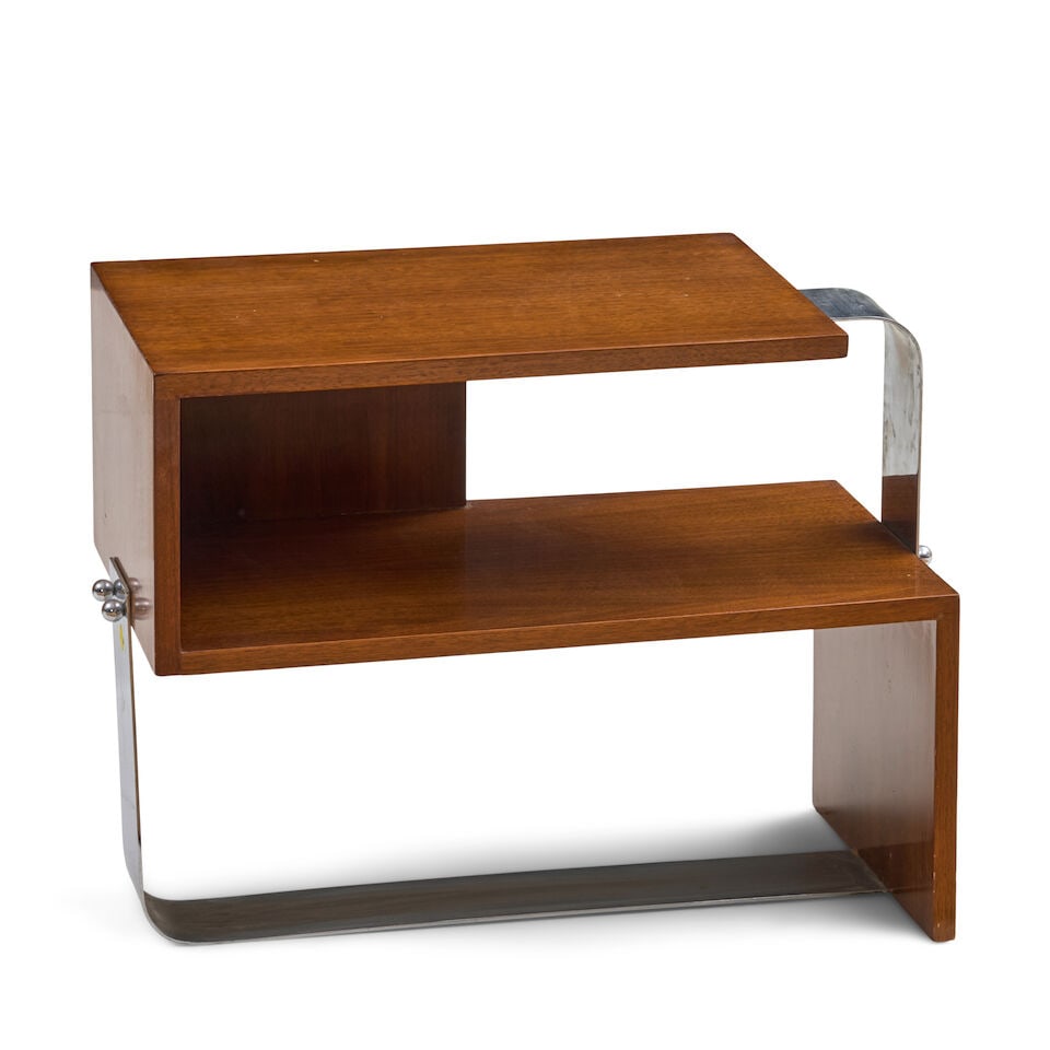 MODERNIST END TABLE mid-20th century, mahogany veneer, chromed steel, unmarked, ht. 21, wd. 27, ...: MODERNIST END TABLE mid-20th century, mahogany veneer, chromed steel, unmarked, ht. 21, wd. 27, dp. 14 in. For further information on this lot please visit Bonhams.com For further information about th